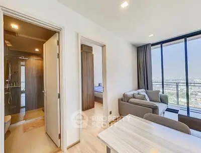 Modern apartment with open living area and stunning city view