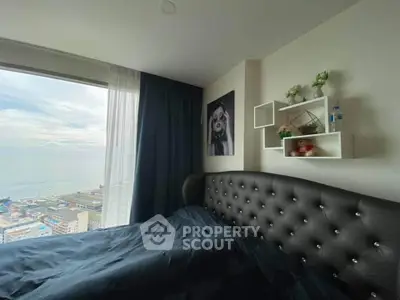 Luxurious bedroom with stunning ocean view and elegant decor