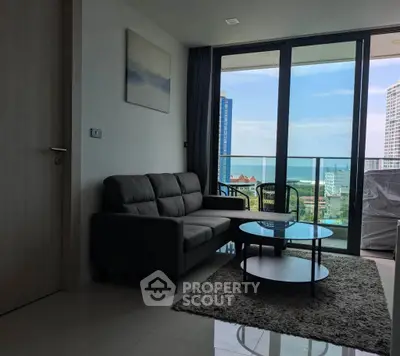 Modern living room with ocean view and large balcony in luxury apartment