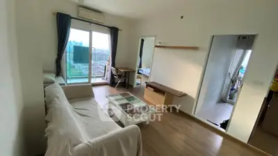Spacious living room with balcony and city view in modern apartment
