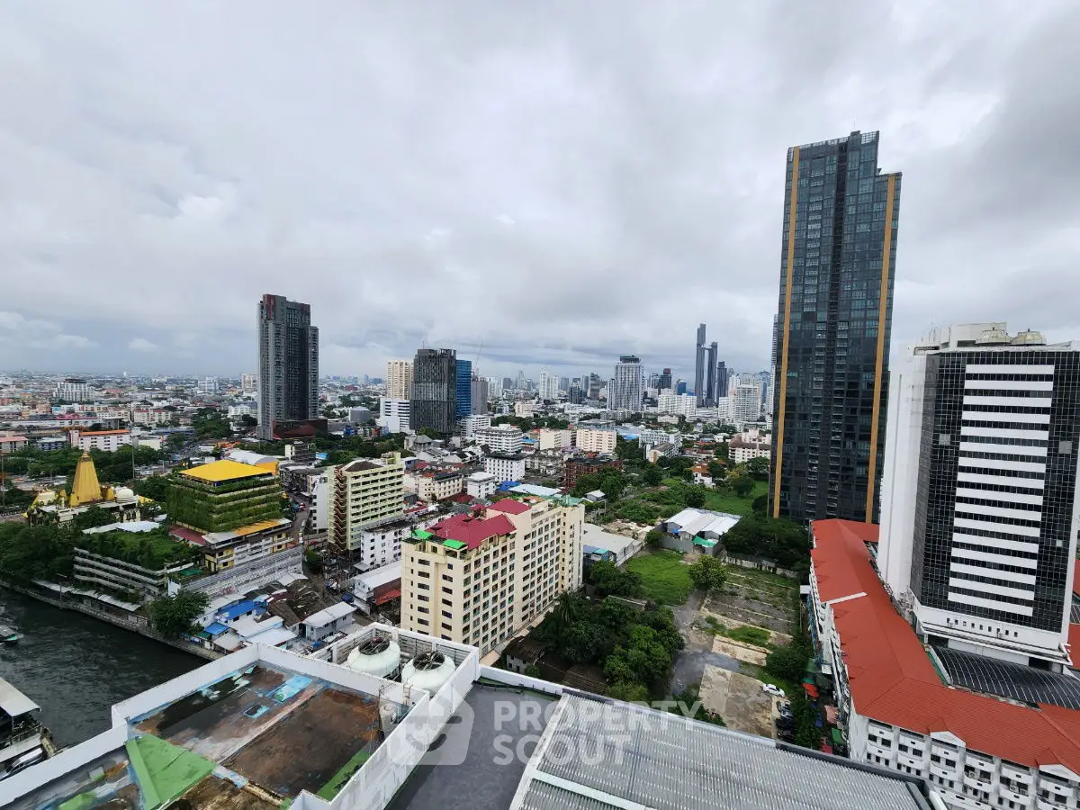 Stunning cityscape view from high-rise building showcasing urban skyline and vibrant architecture.