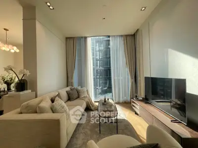 Luxurious modern living room with floor-to-ceiling windows and elegant decor