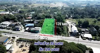 Prime land plot for sale with road frontage and scenic views, ideal for development.