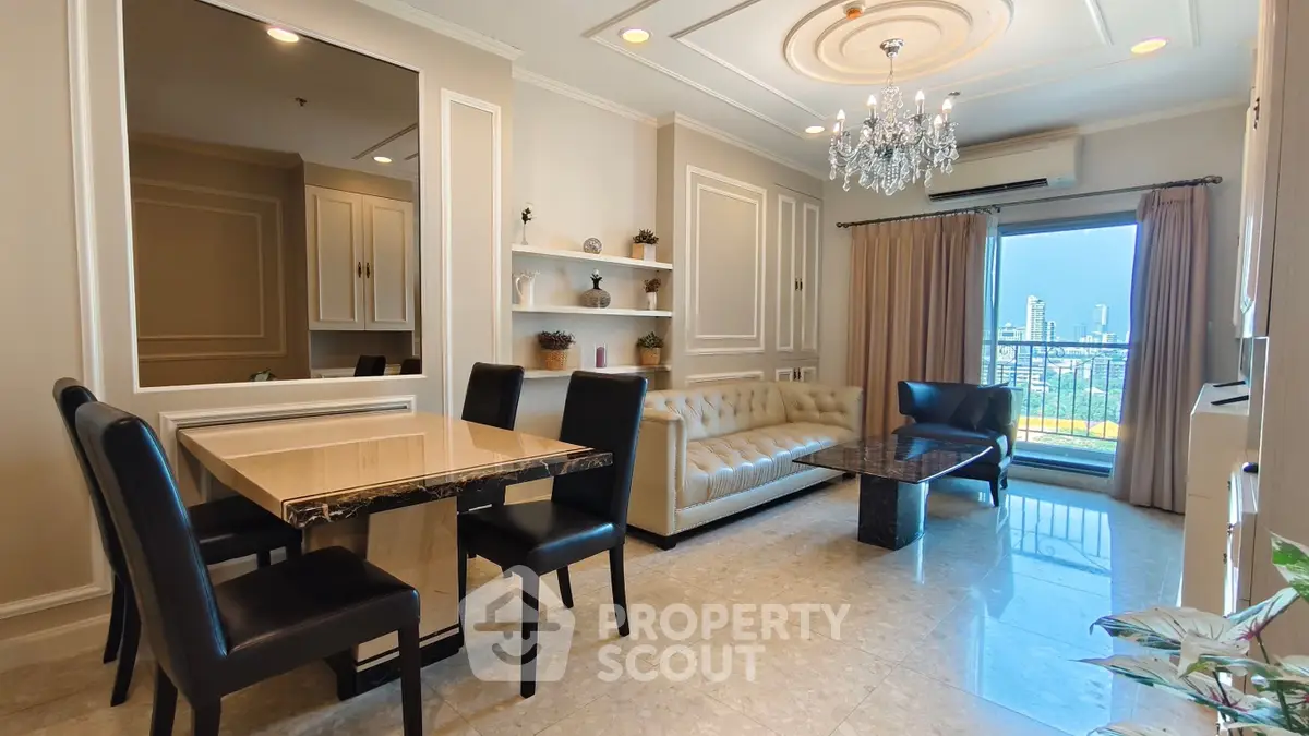 Luxurious living room with elegant chandelier and city view balcony in upscale apartment.
