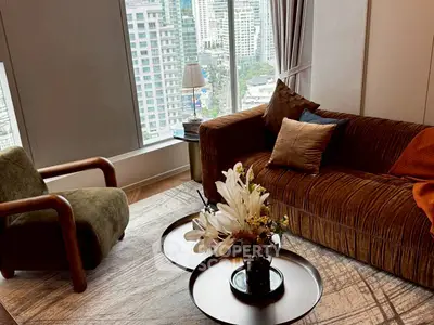 Luxurious living room with city view, elegant furniture, and stylish decor in high-rise apartment.