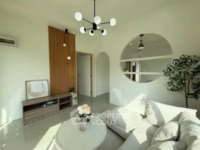 Modern living room with stylish decor and natural light