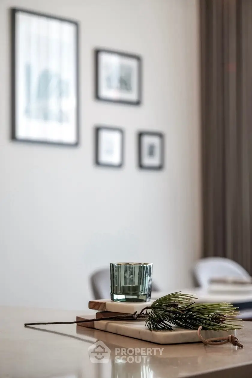 Stylish interior with modern decor and framed art on wall