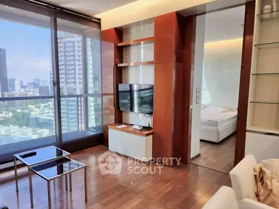 Luxurious high-rise apartment with stunning city view and modern interior design.