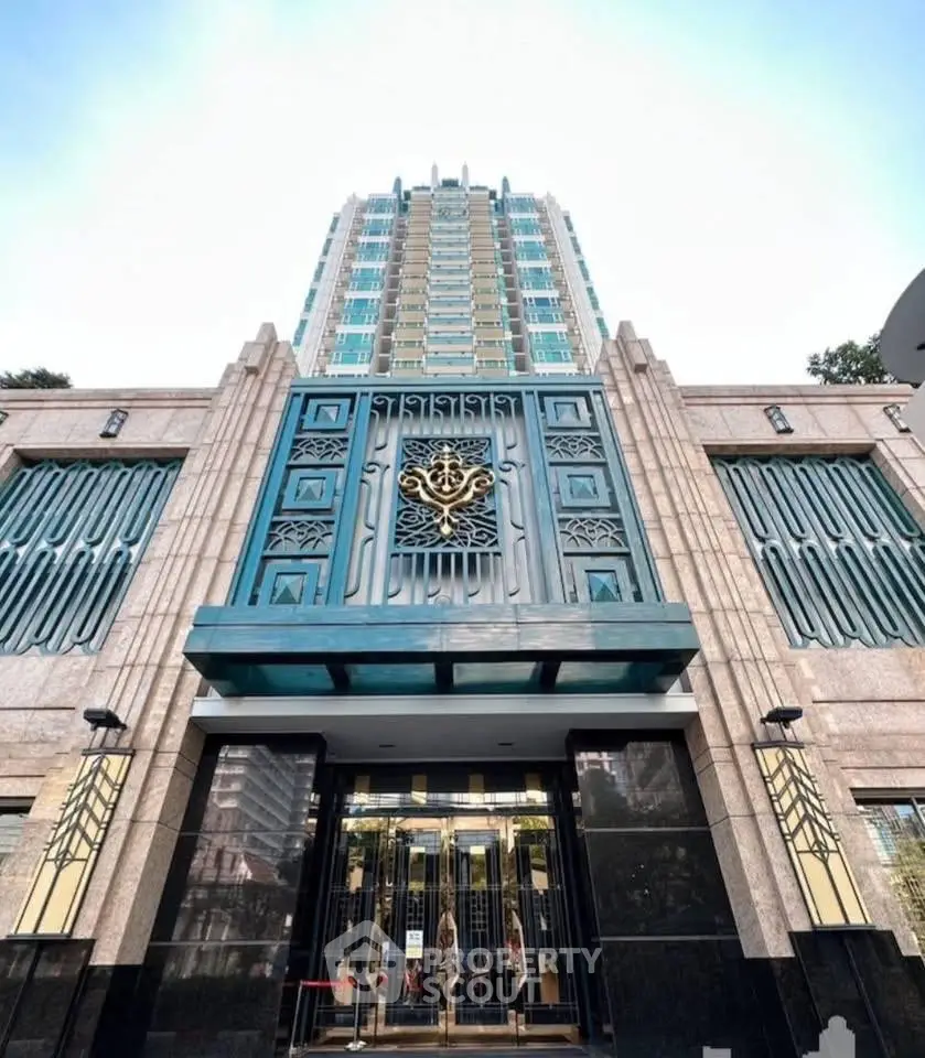 Stunning art deco building entrance with intricate architectural details and modern design.