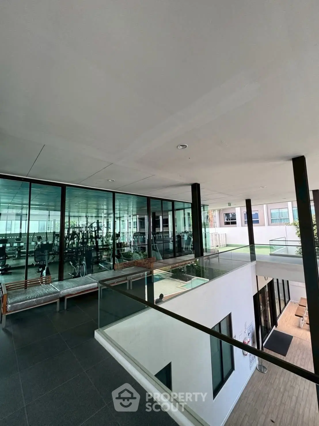 Modern gym with glass walls in a contemporary building