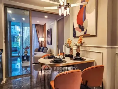 Stylish modern dining area with elegant decor and open view to cozy living room