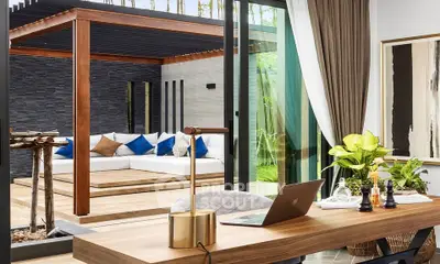 Luxurious modern living room with open layout and stylish outdoor seating area, perfect for relaxation and entertainment.