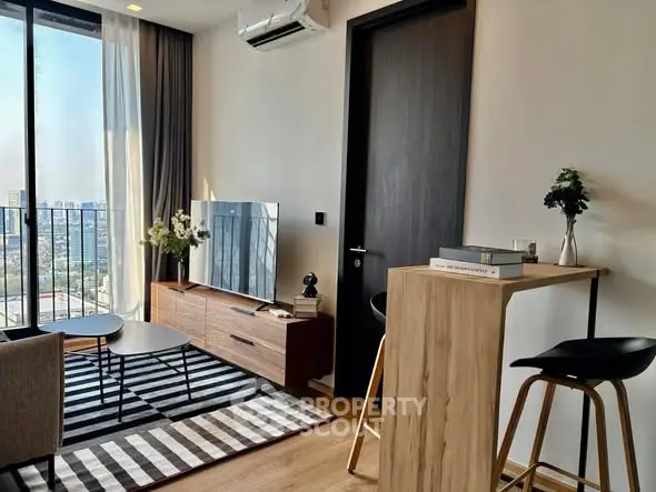 Modern living room with city view, stylish furniture, and natural light.