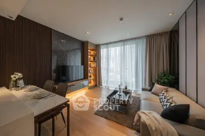Luxurious modern living room with elegant decor and large windows offering city views.