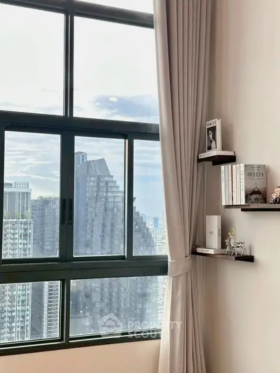 Modern high-rise apartment with stunning city view and elegant interior decor.