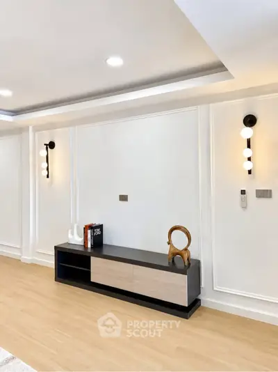 Modern living room with elegant lighting and stylish console table