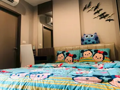 Charming bedroom with playful decor and cozy atmosphere, perfect for a child's retreat.