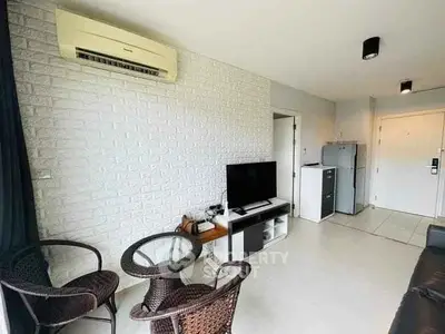 Modern living room with air conditioning and stylish furniture in a bright apartment.