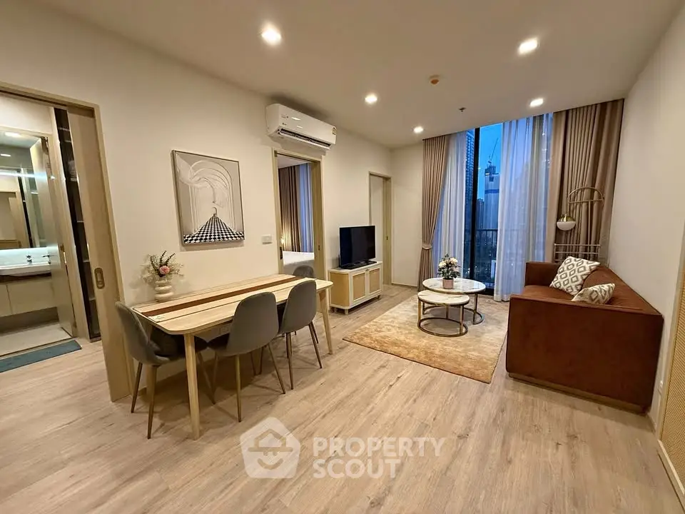 Modern living room with stylish decor, open layout, and natural light, perfect for comfortable living.