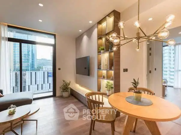 Modern living room with stylish decor and city view balcony