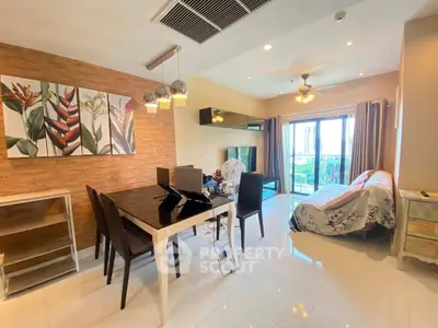 Modern living room with elegant dining area and balcony view