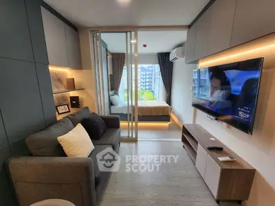 Modern condo interior with cozy living room and stylish bedroom