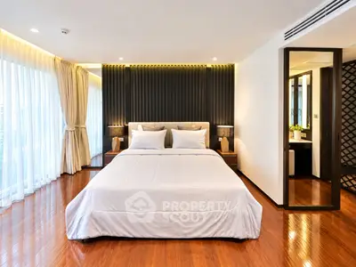 Luxurious modern bedroom with elegant design and ample natural light