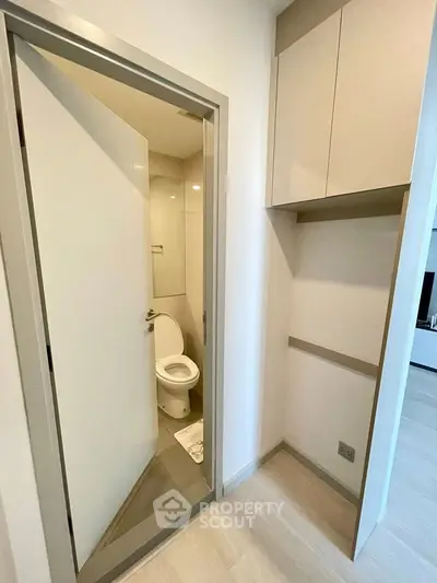 Compact modern bathroom with sleek design and efficient use of space