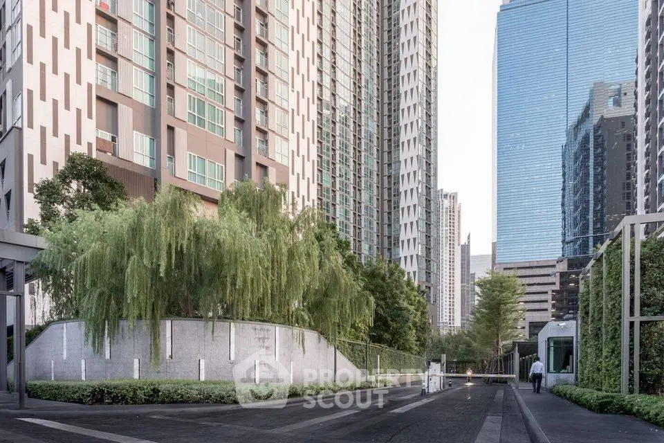 Modern urban residential complex with lush greenery and high-rise buildings