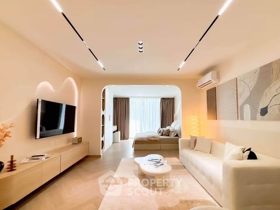 Elegant modern living room with stylish decor and natural light