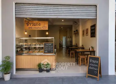 Charming small restaurant with inviting open layout and cozy seating, perfect for casual dining.