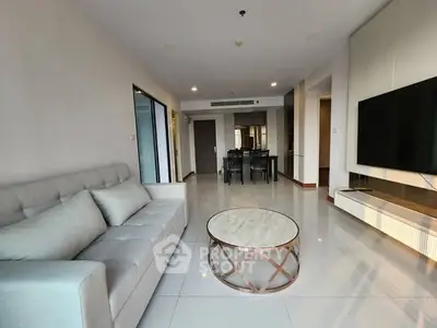 Spacious modern living room with sleek furniture and open layout