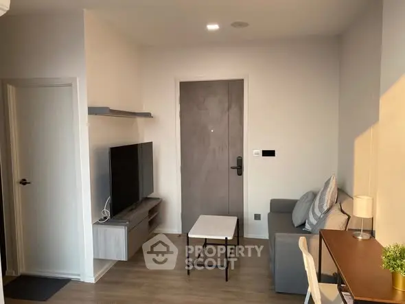 Modern living room with sleek furniture and natural light