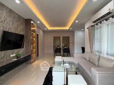 Modern living room with elegant lighting and stylish furniture