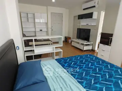 Modern studio apartment with stylish furnishings and open layout