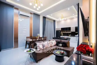 Luxurious modern living room with open kitchen and elegant decor