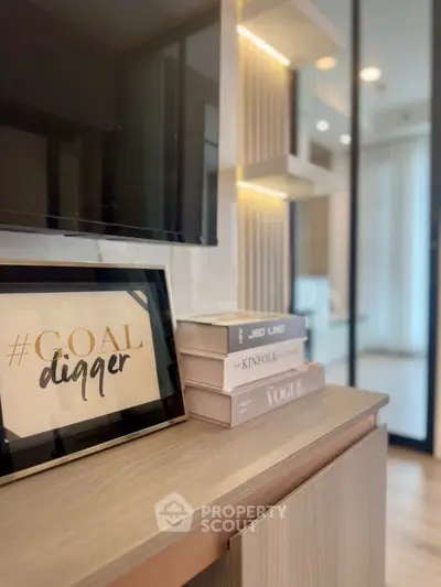 Stylish modern living room with chic decor and elegant shelving.