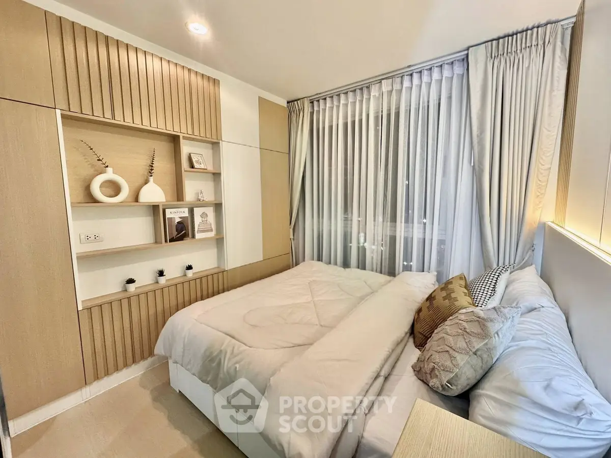 Cozy modern bedroom with elegant decor and natural light