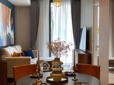 Stylish modern living room with elegant decor and large windows for natural light.