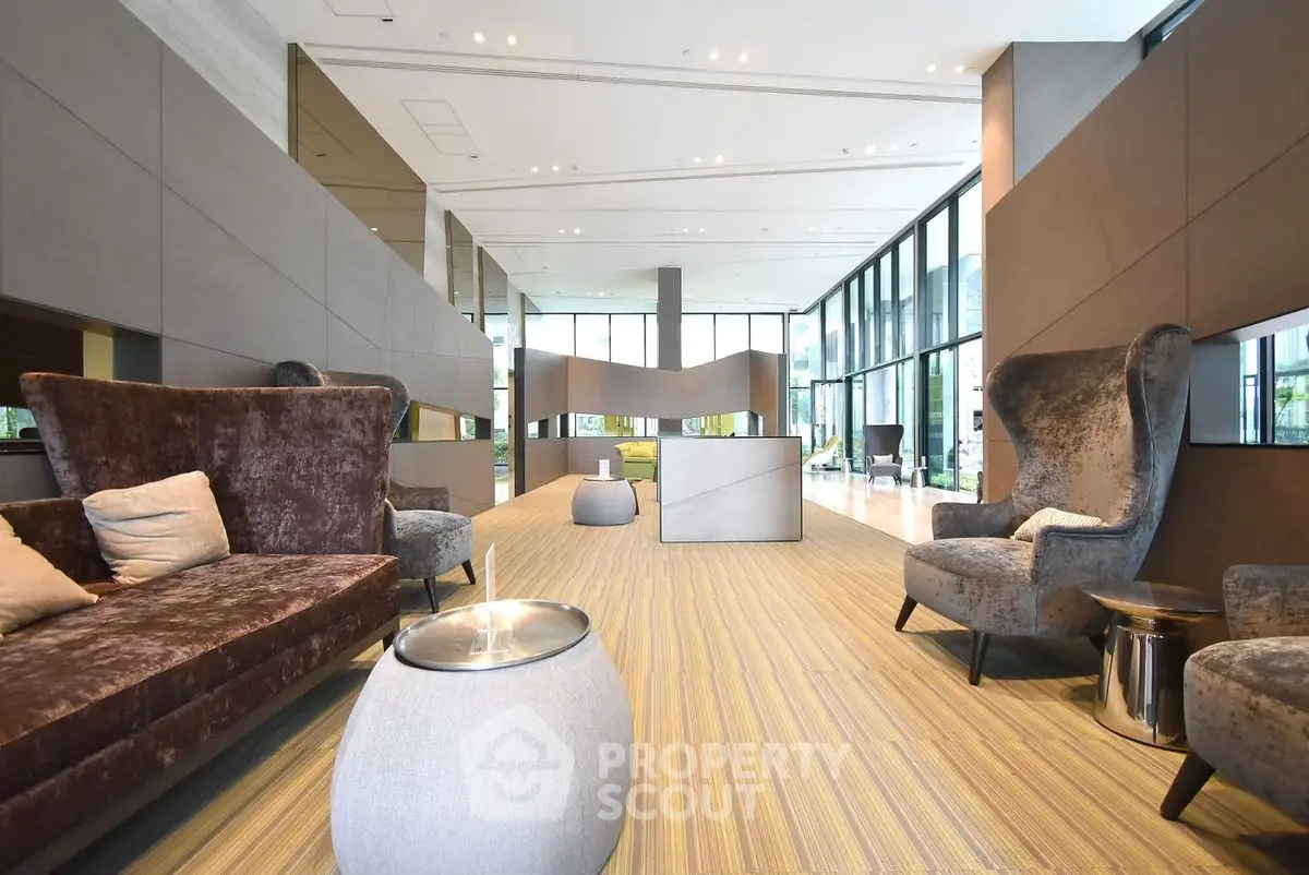 Luxurious modern living room with plush seating and floor-to-ceiling windows