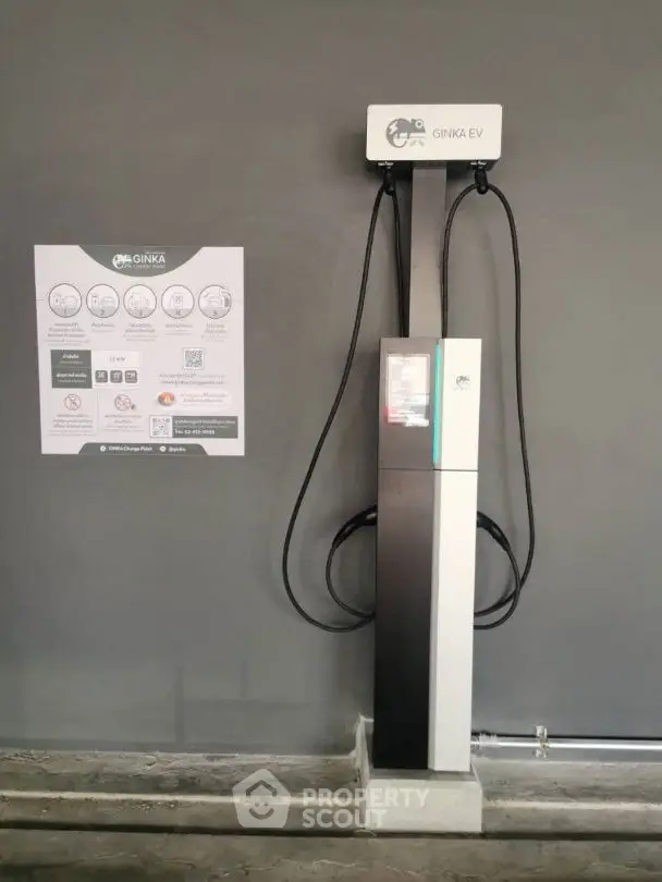 Modern electric vehicle charging station in a sleek parking area