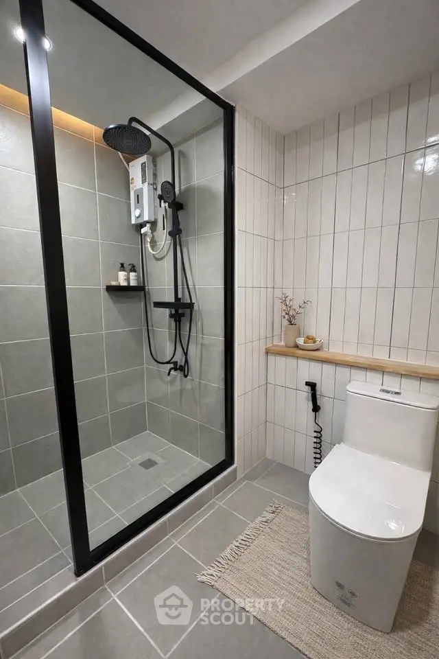 Modern bathroom with sleek shower and contemporary toilet design