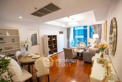 Elegant living room with stylish decor and balcony view in modern apartment