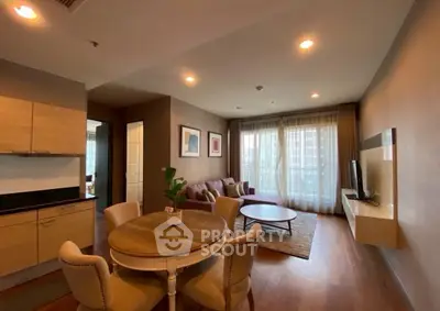 Spacious living room with modern decor and natural light in urban apartment