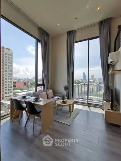Modern living room with floor-to-ceiling windows and city view