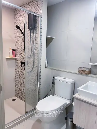 Modern bathroom with sleek shower and contemporary fixtures