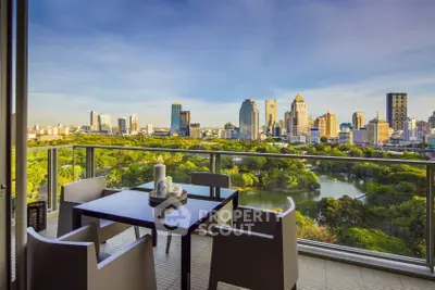 Stunning cityscape view from a modern balcony overlooking lush greenery and skyline.