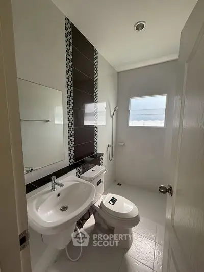 Modern bathroom with sleek fixtures and natural light