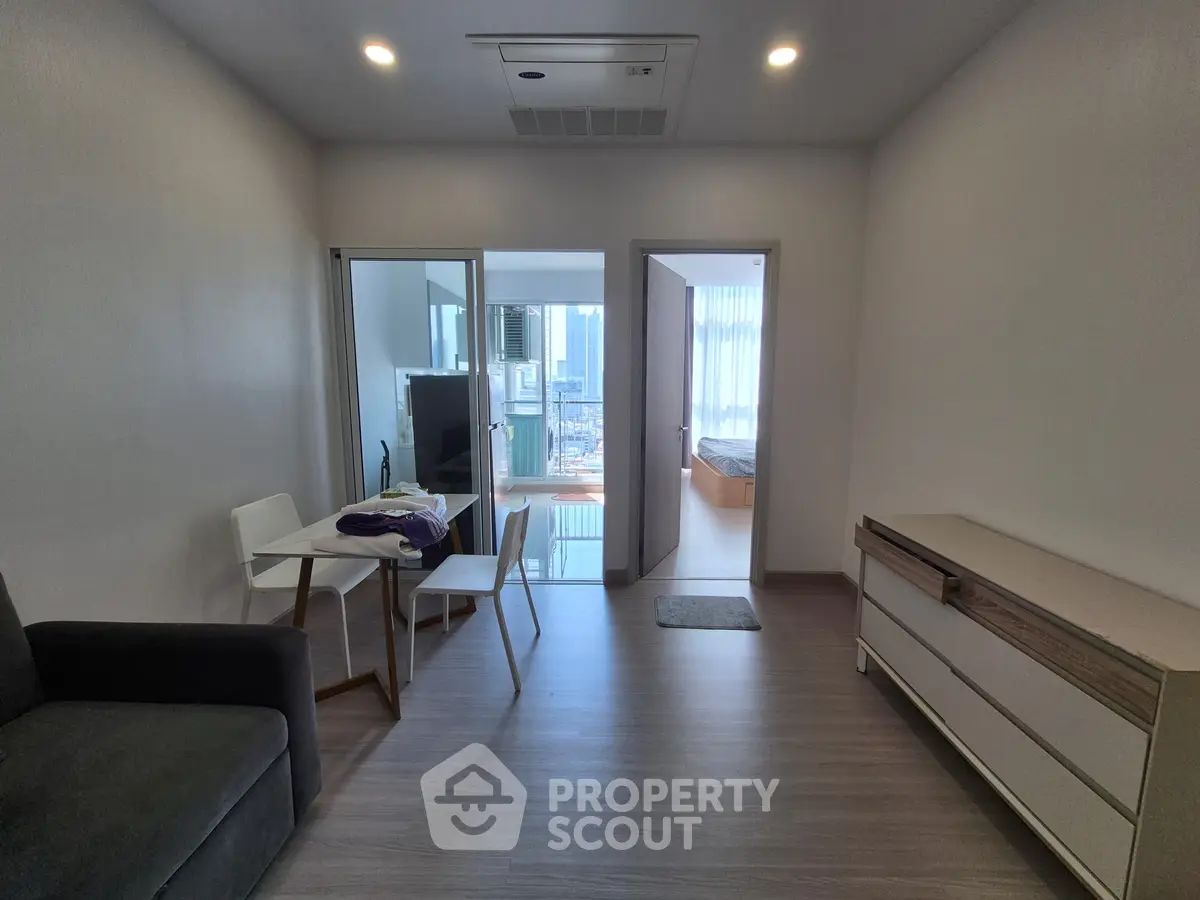 Modern apartment interior with open layout and city view