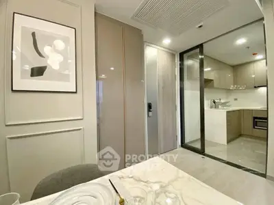 Modern kitchen with sleek design and open layout in a contemporary apartment.